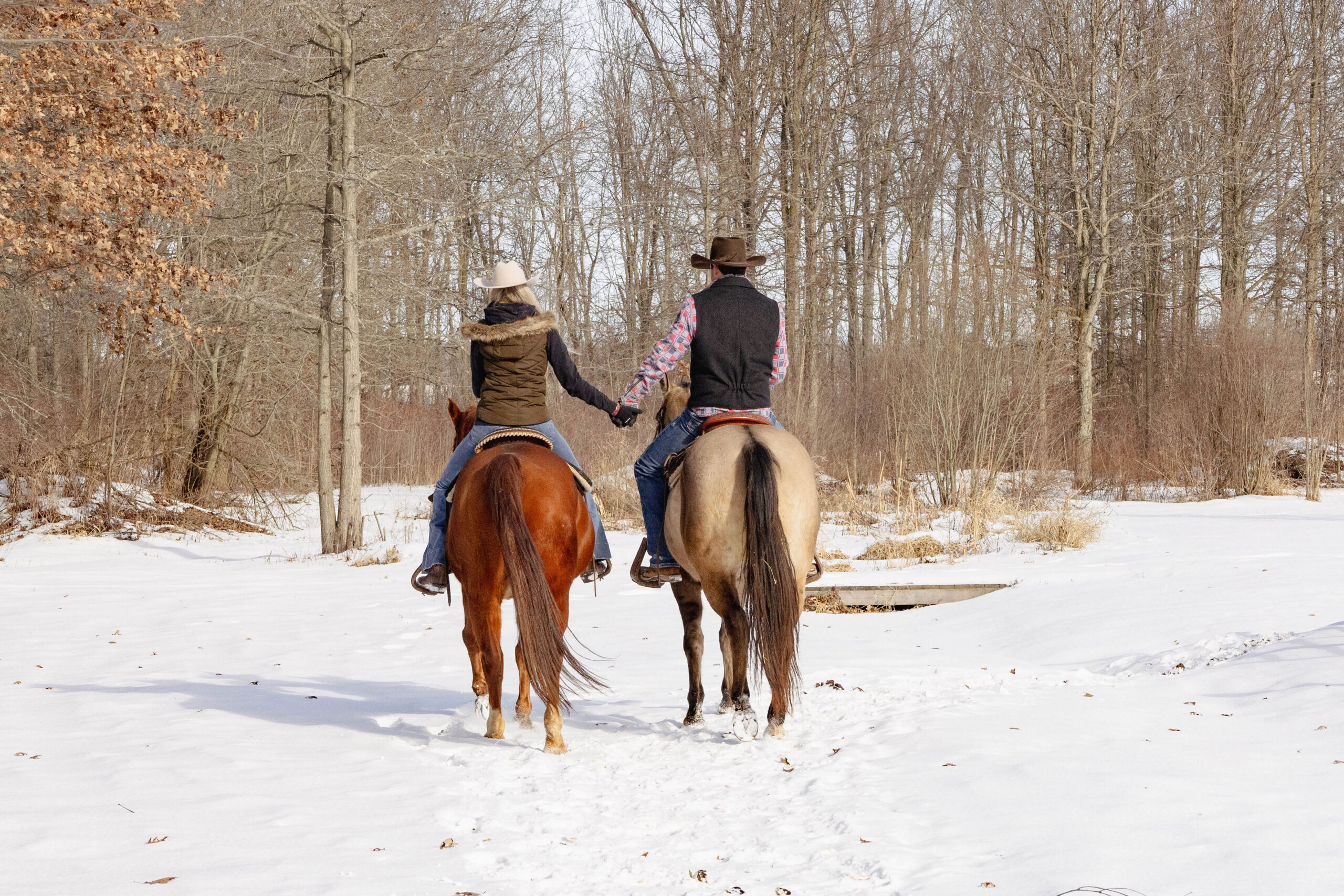 couple riding horseback